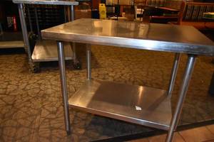 lot 273 image: SS Table 36 W, 24 D, 34 T, adjustable