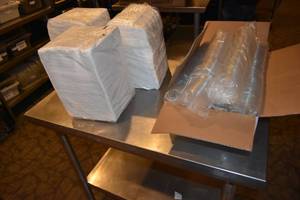 lot 291 image: 3) Stacks napkins, Box of clear lids