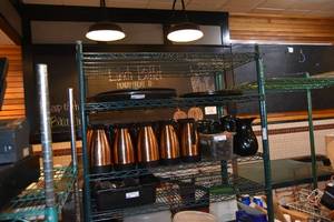 lot 381 image: Six shelf green roller rack 42 W, 24D