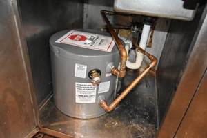 lot 26 image: Electric 5 Gal water heater