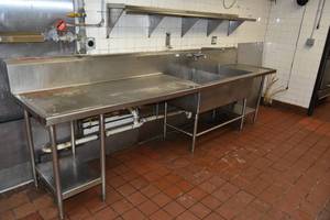 lot 57 image: Sink with counter 133 L x 35 T x 31 D