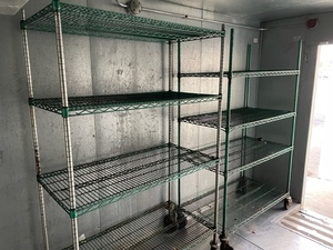 lot 67 image: Three old metal racks in cooler