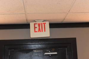 lot 71 image: EXIT sign above south door