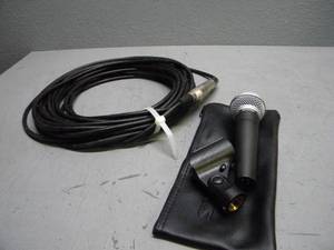 lot 19 image: Shure SM 58 Micholder & 2-50 cord and short cord