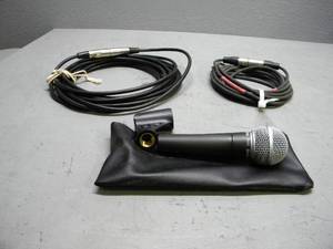 lot 20 image: Shure Mic w 2 mic cords and holder