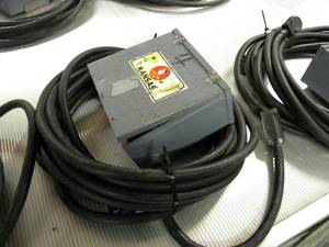 lot 26 image: Box 4 wcord at least 60 w 50 amp plug and stand