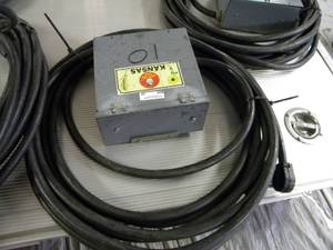 lot 32 image: Box 10 w cord at least 60 w 50 amp plug and stand