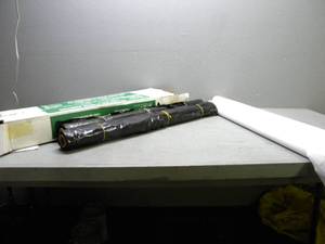 lot 70 image: 4 Rolls black plastic, table cloth & vinyl rolls