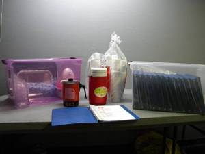 lot 69 image: 24 Music binders, trays, paper cups, cooler