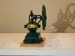 lot 1 image: Hand crank coffee grinder