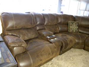 lot 16 image: L shaped micro-suede leather couch wpower recliners Just like new