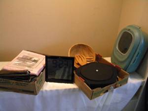 lot 44 image: Hot plate,clock, linens, animal feeder