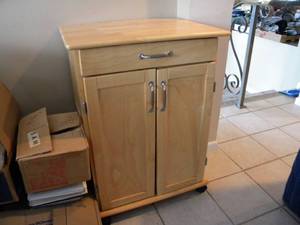 lot 74 image: Roller kitchen cabinet with drawer