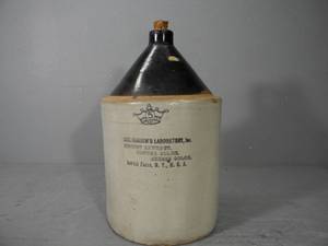 lot 19 image: 5 gal Brown top Jug with advertising