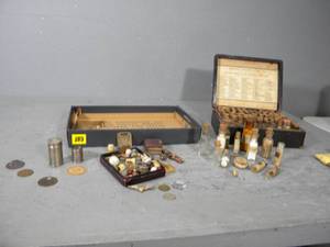 lot 64 image: Tray of tokens & pharmacy kit