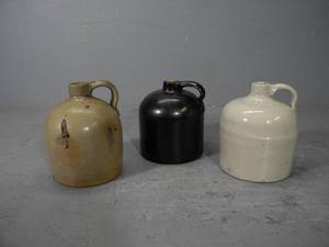 lot 73 image: Three small shoulder jugs