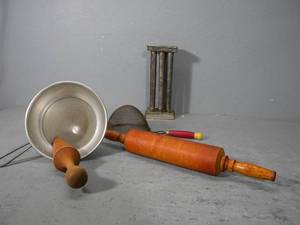lot 80 image: Colander, rolling pin, candle molds