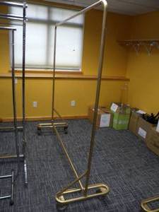 lot 22 image: 4 Wheel garment display rack 6 long x 75 tall