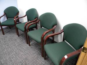 lot 73 image: 4) Green padded arm chairs for office