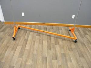 lot 89 image: Vevor Orange Z clothing rack on rollers