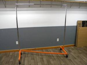 lot 94 image: Vevor Orange Z clothing rack on rollers