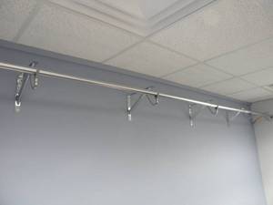 lot 134 image: Chrome garment rack for wall 14 long