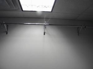 lot 135 image: Chrome garment rack for wall 7.5 long