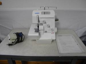 lot 150 image: Juki Serger MO 623 3 spools plus manual