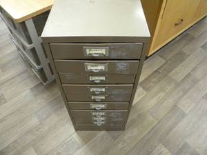 lot 171 image: Metal File cabinet with lots of buttons-many colors