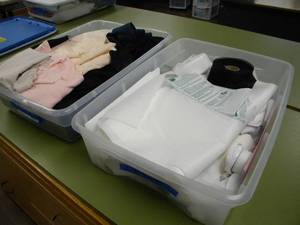 lot 187 image: Two tubs of lining and interfacing fabrics