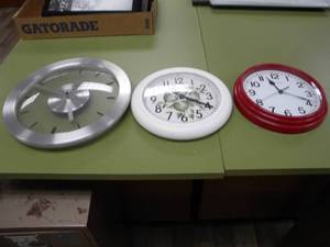 lot 218 image: Three battery wall clocks