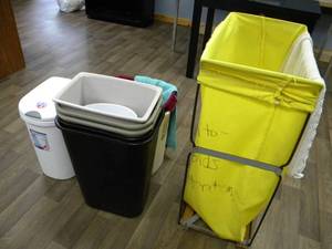 lot 239 image: Grey step stool, waste baskets, clothing bag