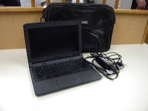 lot 151 image: Dell Chrome Book CKZ 6832 wdigital clock &amp case