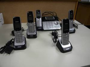 lot 154 image: Two line Vtech phone w five wireless units