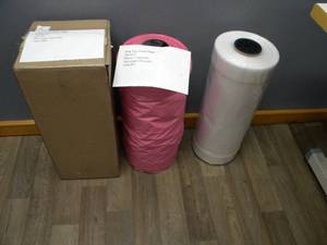 lot 165 image: Clear and Pink Poly down bags, Jacket bags