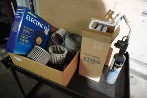 lot 48 image: Electric Fan, New evaporator, fans &amp blades