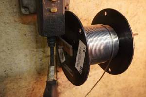 lot 97 image: Roll of solder approx 5# left on roll