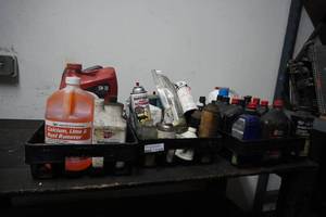 lot 113 image: 5) Flats of oil, rust remover, cleaners & table