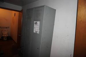 lot 141 image: Three metal door clothes hamper cabinet