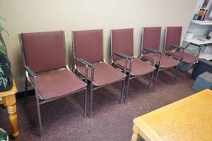 lot 158 image: Five stacking maroon office chairs