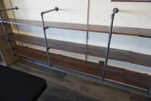 lot 8 image: Piping board shelves 8 foot long, 3 shelves