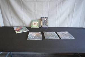 lot 13 image: Starfinder book, 3 flip mats, flip tile, and starfinder miniatures