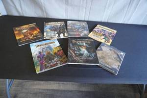 lot 22 image: Pathfinder 2nd edition books, flip-mats, and advanced players guide sheet pack