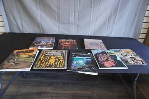 lot 45 image: Books from games, and coloring book, info in description