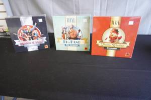 lot 54 image: Vinyl board game and expansion packs