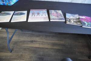 lot 63 image: Game books, and character sheets,