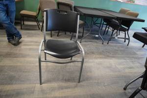 lot 202 image: 10) Black Lifetime stacking chairs