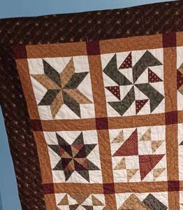 lot 24 image: Autum Warmth Quilt