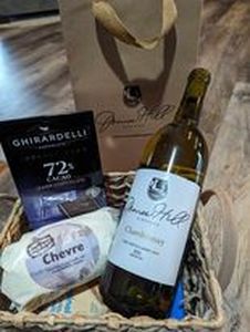 lot 62 image: Homemade Chevre Goat Cheese, Wine and Chocolates