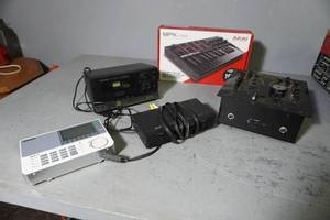 lot 37 image: Numark MX100 Box, MDK Midi controller-new, Optimus cassette deck, Sangean radio